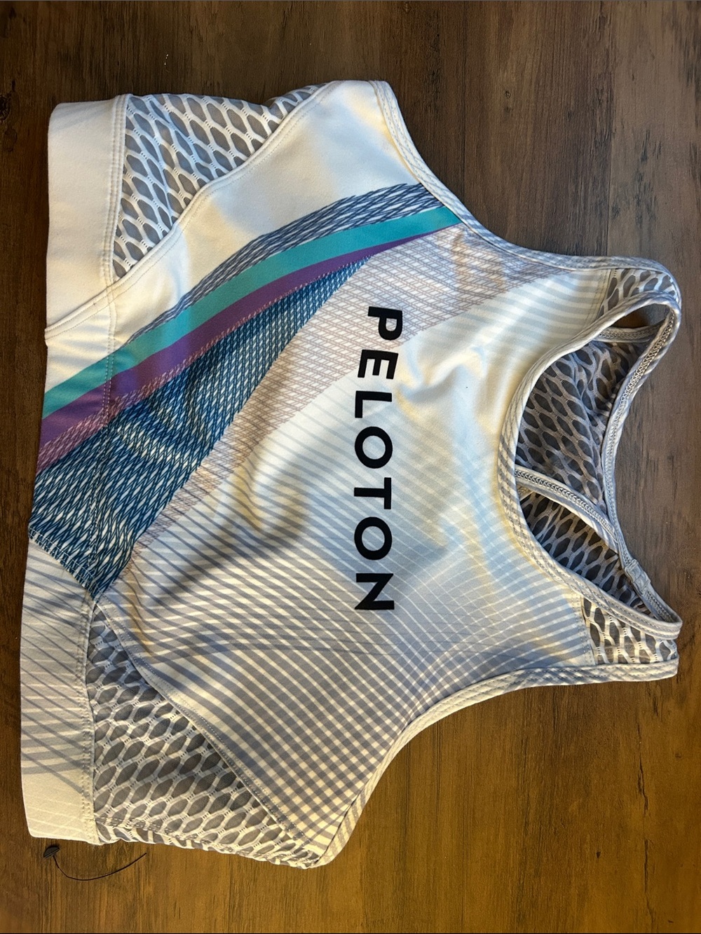 Peloton White Sports bra with Aqua and Purple Stripes